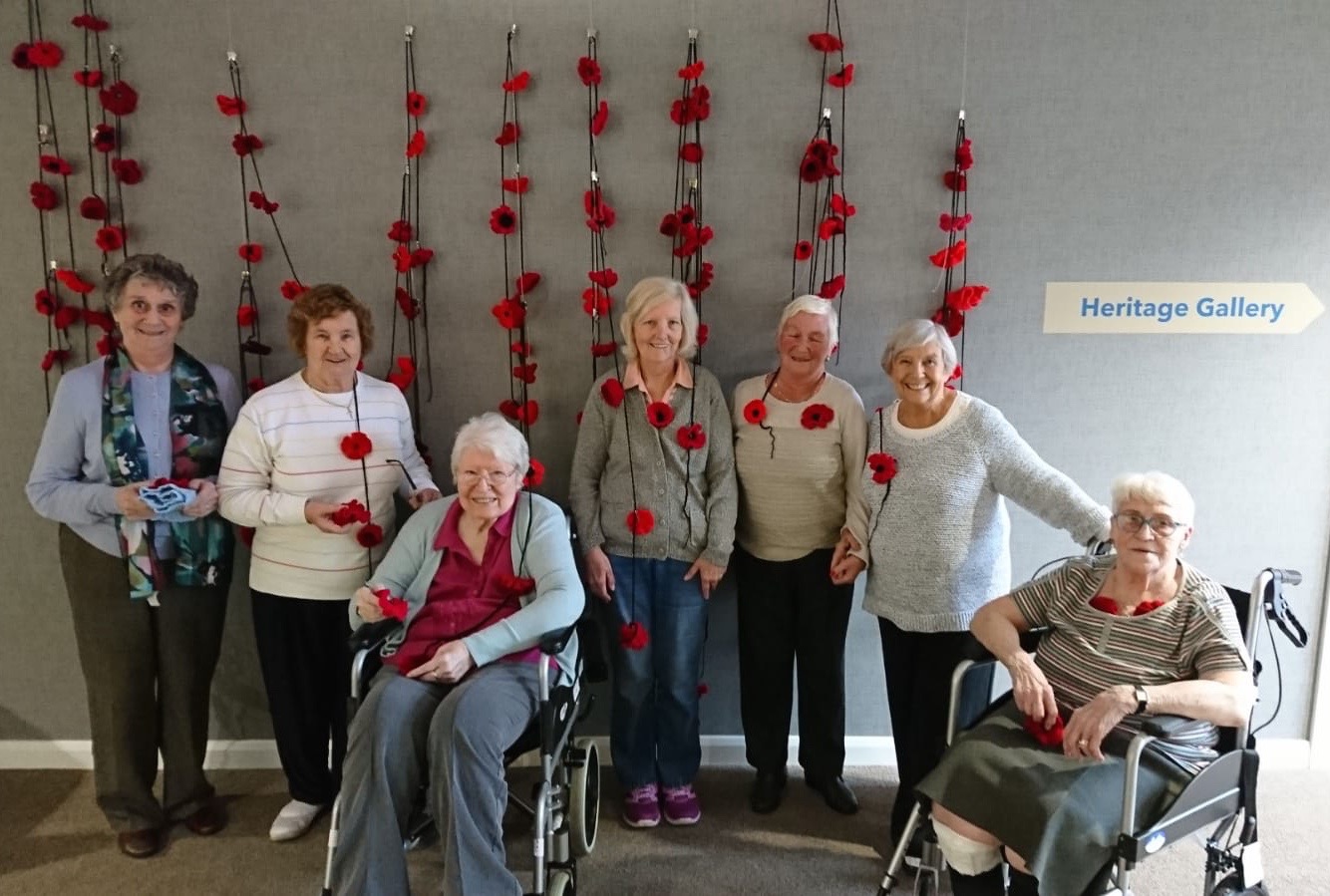 RESIDENTS CREATE ‘WEEPING WALL’ OF POPPIES